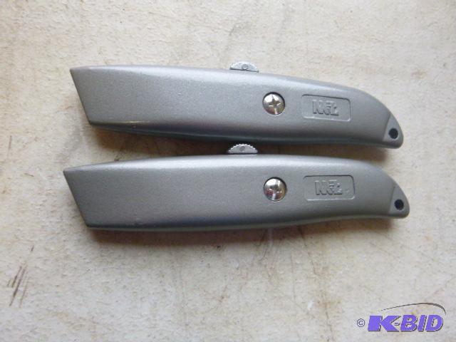 lot 52 image: Two Mit Utility Knives...