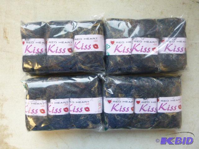 lot 91 image: Four Packs of 3 Red Heart Kiss Yarn...