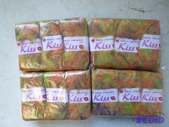 lot 92 image: Four Packs of 3 Red Heart Kiss Yarn...