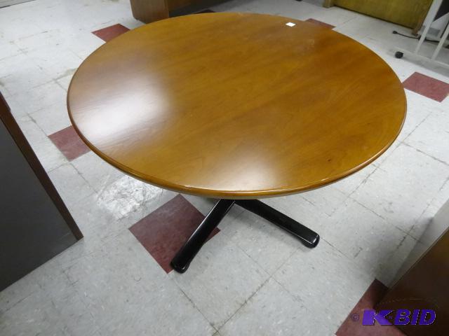 lot 127 image: 42" Round Table...