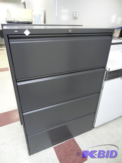 lot 20 image: 36" Metal 4 Drawer Lateral File. Has Loc...