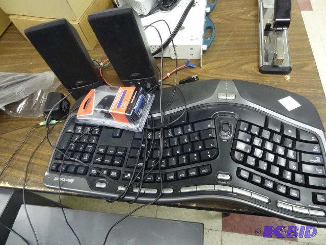 lot 29 image: Computer Keyboard, Accent Computer Speakers. ...