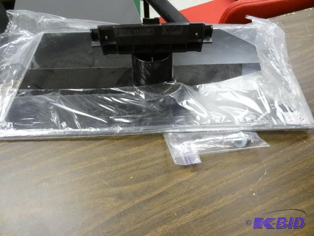 lot 34 image: Flat Panel TV Base. BN96-09933A...