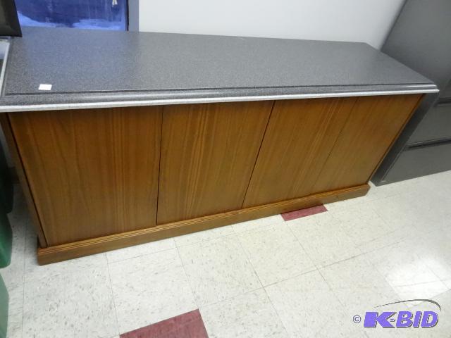 lot 7 image: 4 Door Wood Credenza. Has a Granite Looking T...