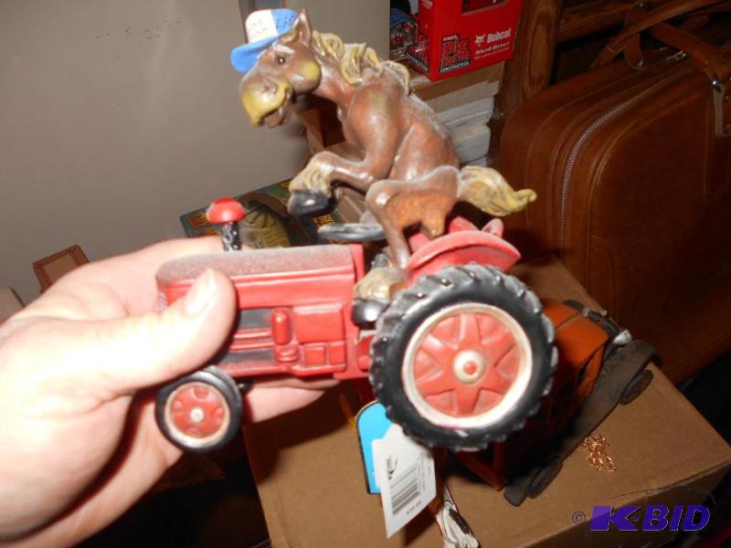 lot 117 image: Elmer horse driving tractor by Montana Silver...