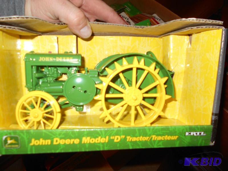 lot 124 image: John Deere Model D Toy Tractor. New in box. M...