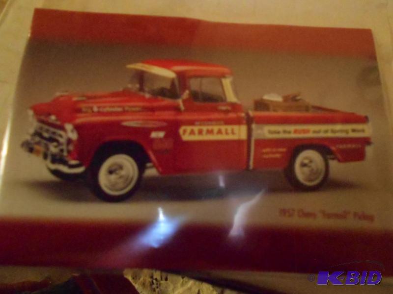lot 131 image: 1957 Chevy Farmall Pickup. Metal. New in Box...