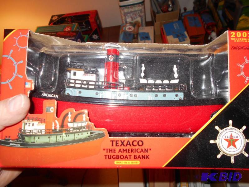 lot 149 image: Texaco Tugboat bank. Metal. New in Box...
