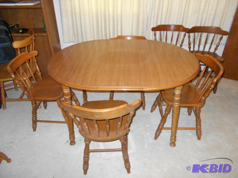 lot 16 image: Dining room table and six chairs. Wood. Some ...