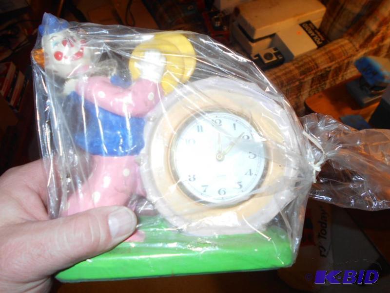 lot 168 image: clown clock...