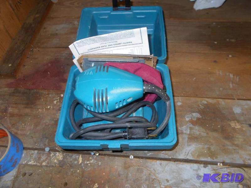 lot 217 image: Makita finishing sander...