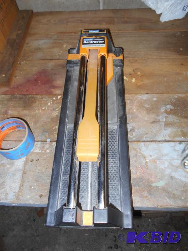 lot 218 image: Tile cutter...