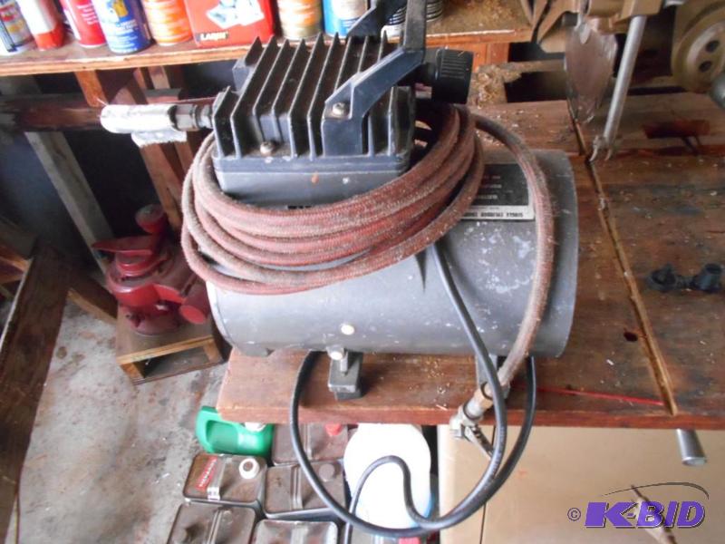 lot 232 image: portable 110v compressor with tire chuck...