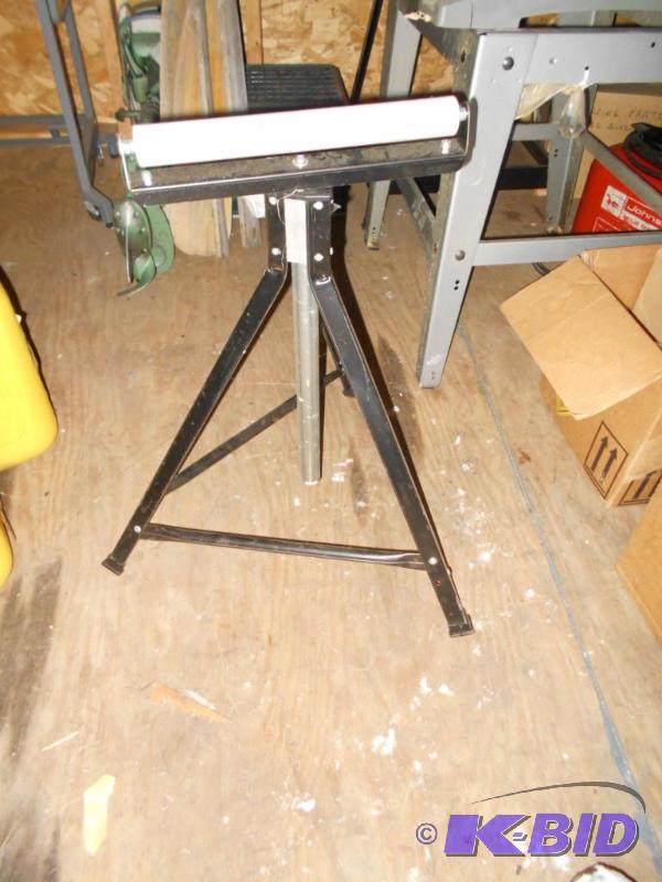 lot 243 image: Roller stand to hold wood up for saw....