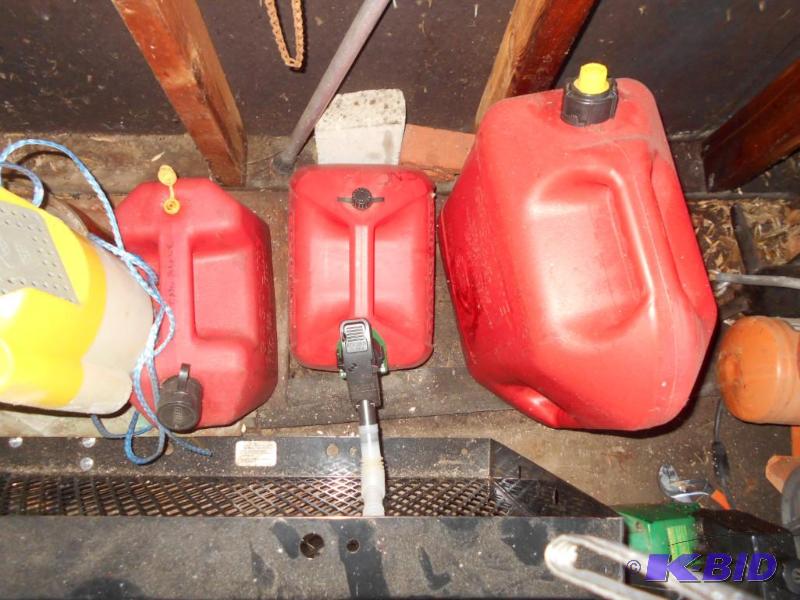lot 261 image: gas and diesel cans...