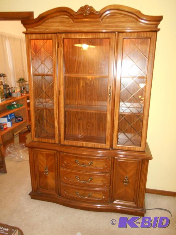 lot 28 image: china cabinet, wood with lights, 52x1680...