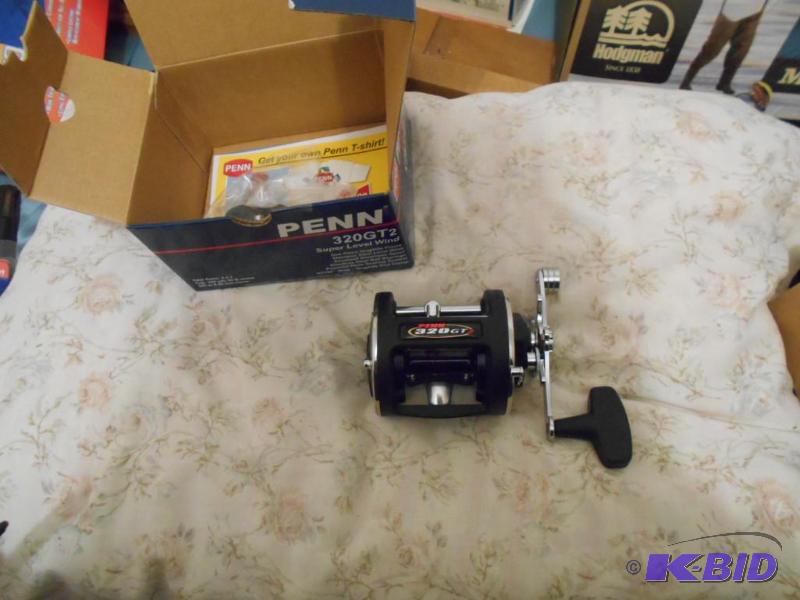 lot 297 image: Penn 320 GT2 reel. New in box...
