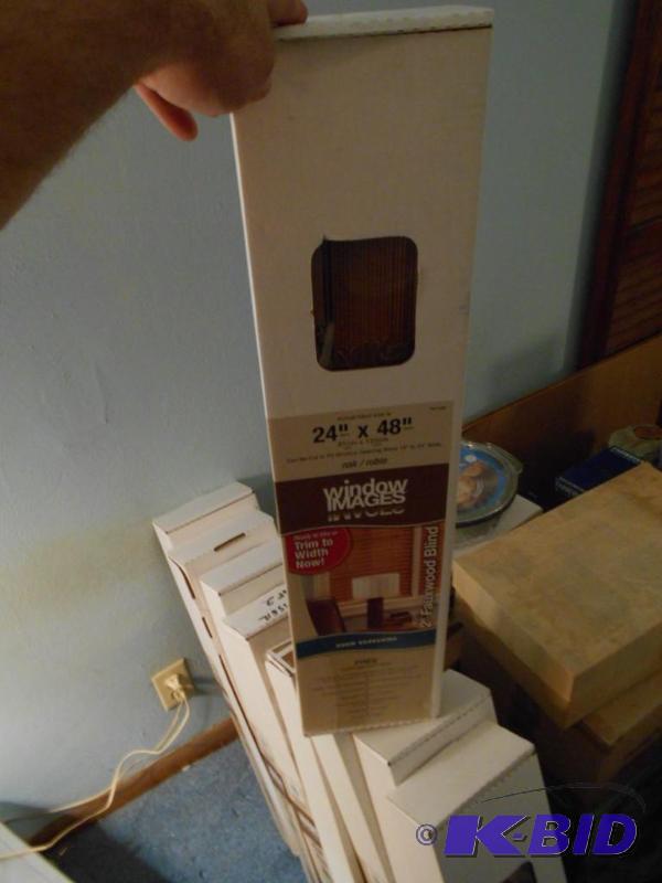 lot 52 image: window shades. Faux wood blind. 24X48 set of ...