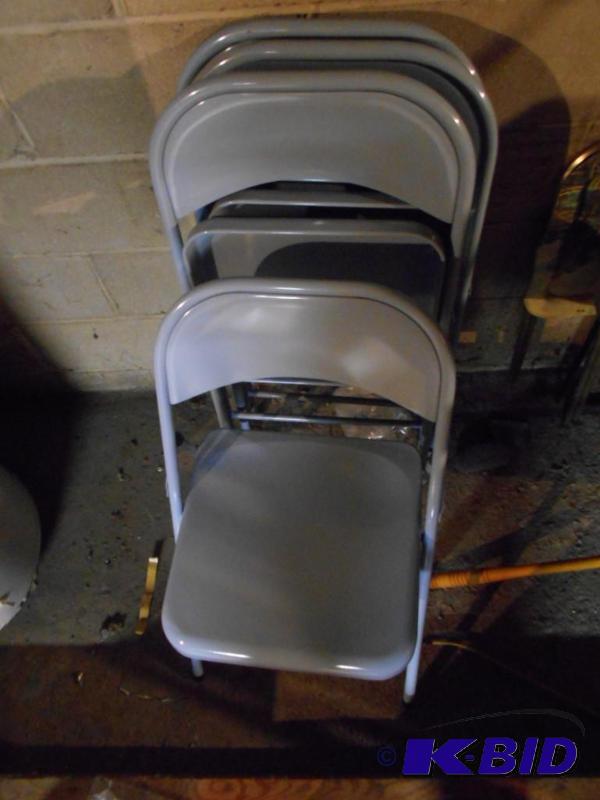 lot 71 image: Four metal folding chairs...