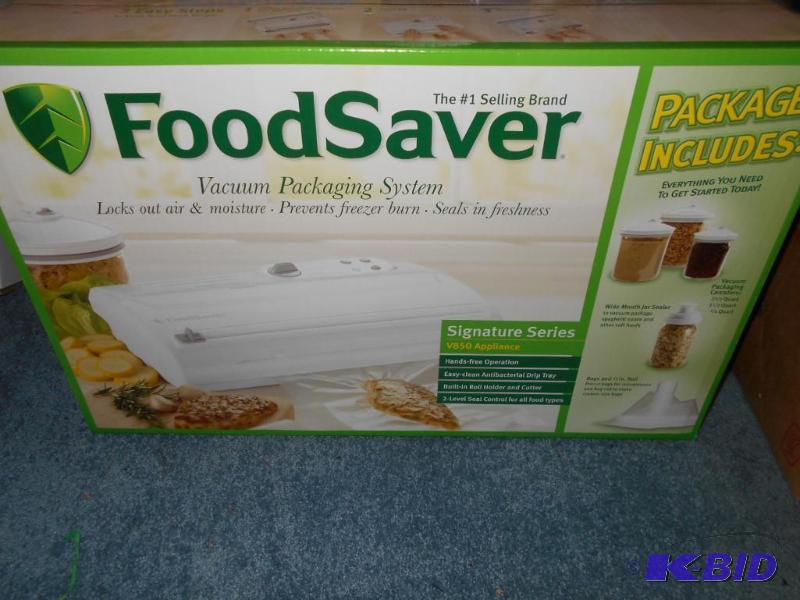 lot 87 image: Food Saver-new in box...