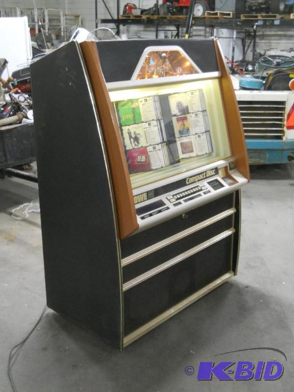 lot 19 image: Rowe CD100A Jukebox. Full of CDs.
