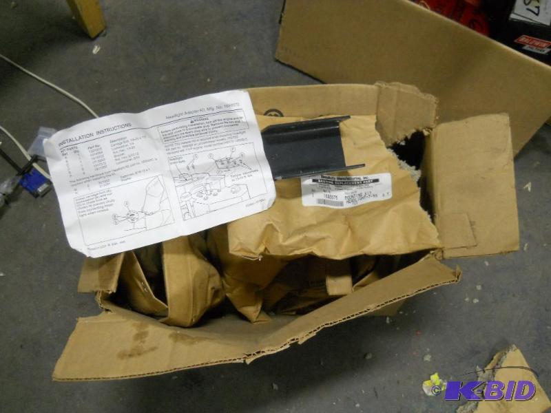 lot 54 image: Box of New Simplicity Riding Mower Parts.