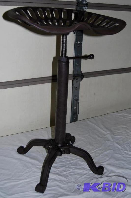 lot 11 image: Farmhouse Tractor Adjustable Stool, powder co...