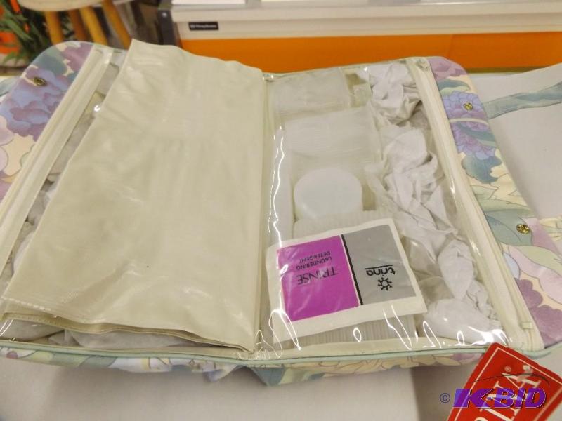 NEW travel toiletry bag with empty bottles