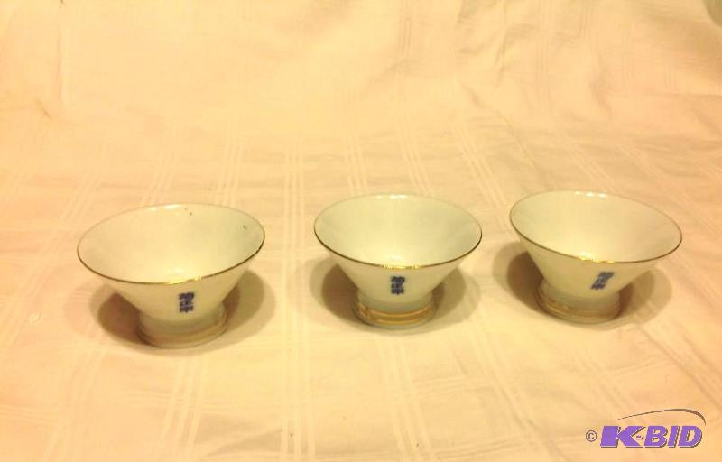 3 small porcelain sake cups marked made in Ja...