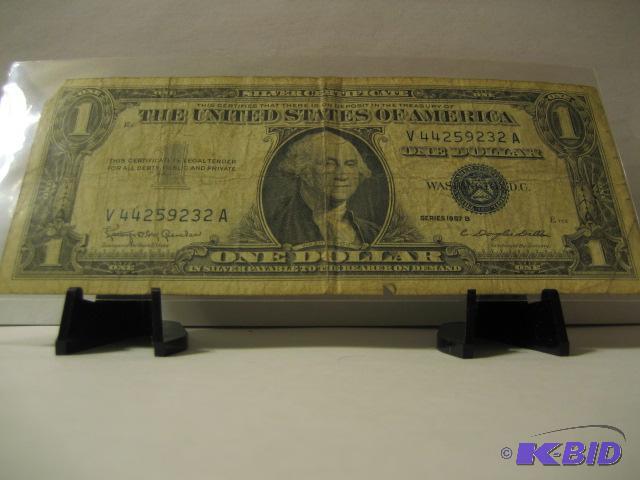 lot 131 image: 1957 ONE DOLLOR SILVER CERTIFICATE...