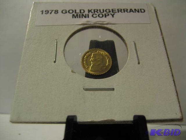 lot 21 image: 1978 GOLD KRUGERRAND MINI COPY...