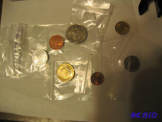 lot 88 image: BAG 0F UNCIRCULATED MIXED FOREIGN COINS...