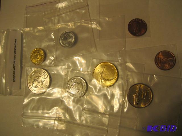 lot 89 image: BAG OF UNCIRCULATED MIXED FOREIGN COINS...
