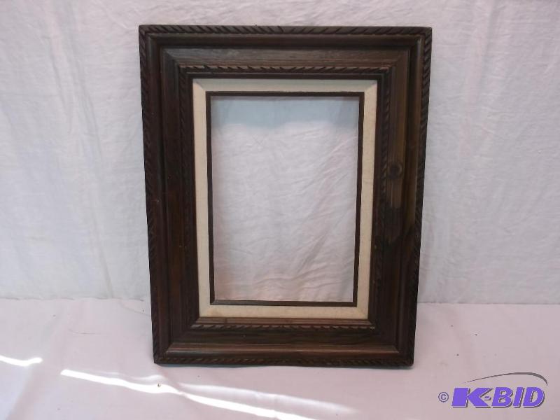 lot 104 image: Solid wood frame measuring 16 12" W x 2...