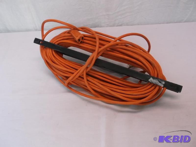 lot 111 image: 100 extension cord with holder....
