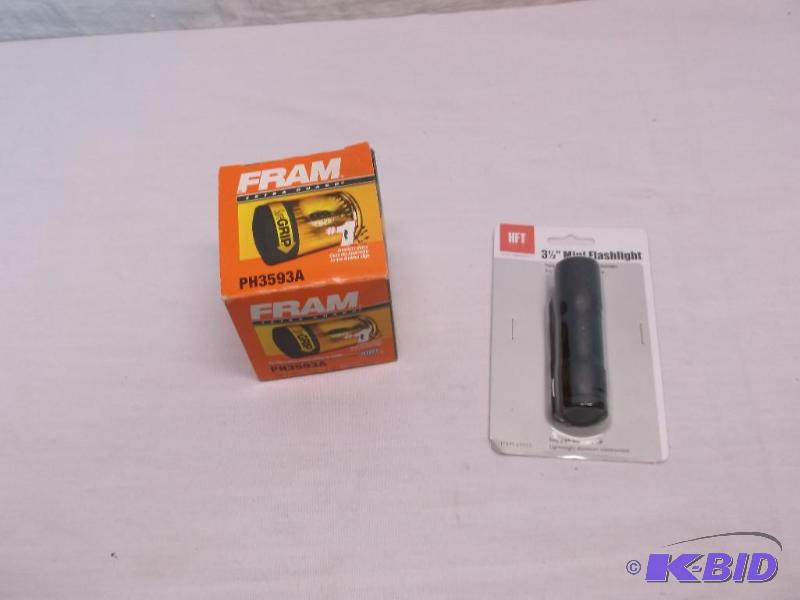 lot 122 image: Flashlight & Fram oil filter PH3593A both...