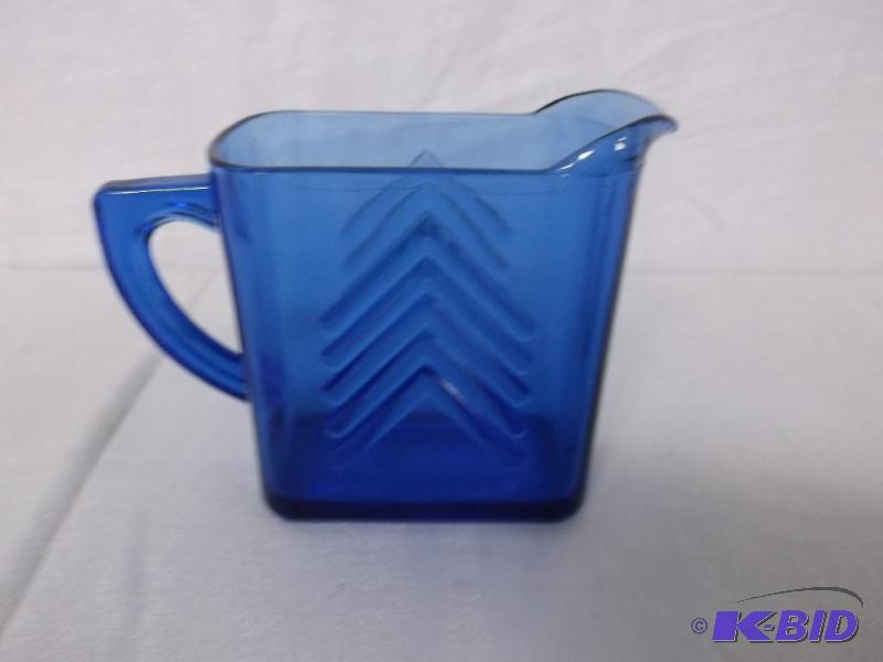 lot 15 image: Vintage blue glass pitcher in great condition...