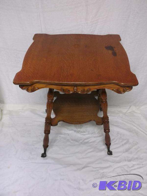 lot 24 image: Vintage table with claw feet with glass ball ...