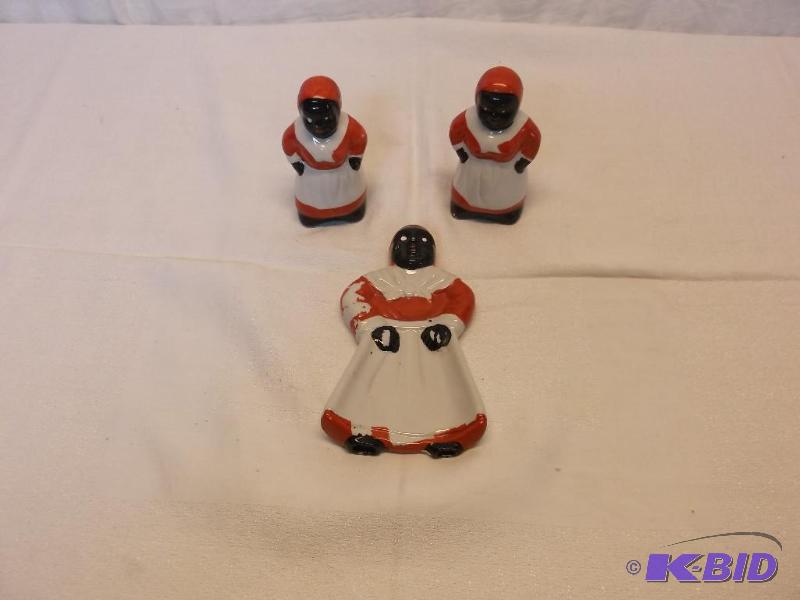 lot 35 image: Aunt Jemima salt & pepper shaker and uten...