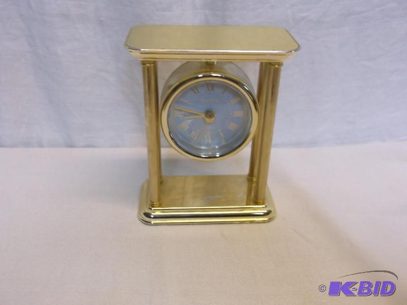 lot 38 image: Nice Bulova mantel clock works....