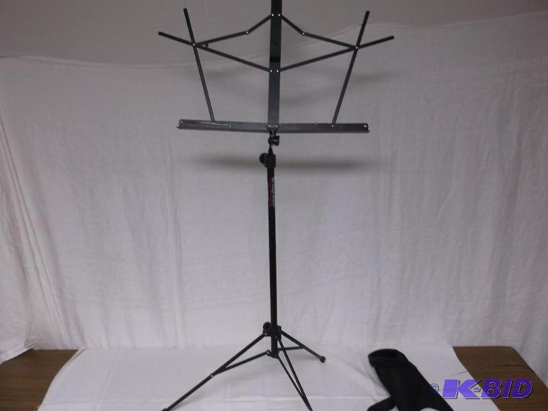 lot 39 image: Music stand with case like new....