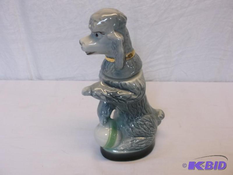 lot 44 image: Collectable poodle decanter....