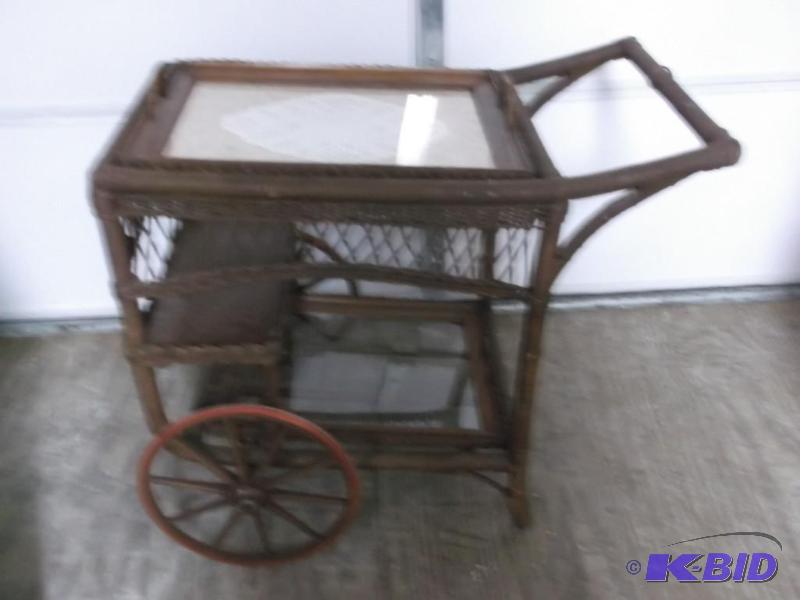 lot 50 image: Nice wicker serving cart measuring 34" L...
