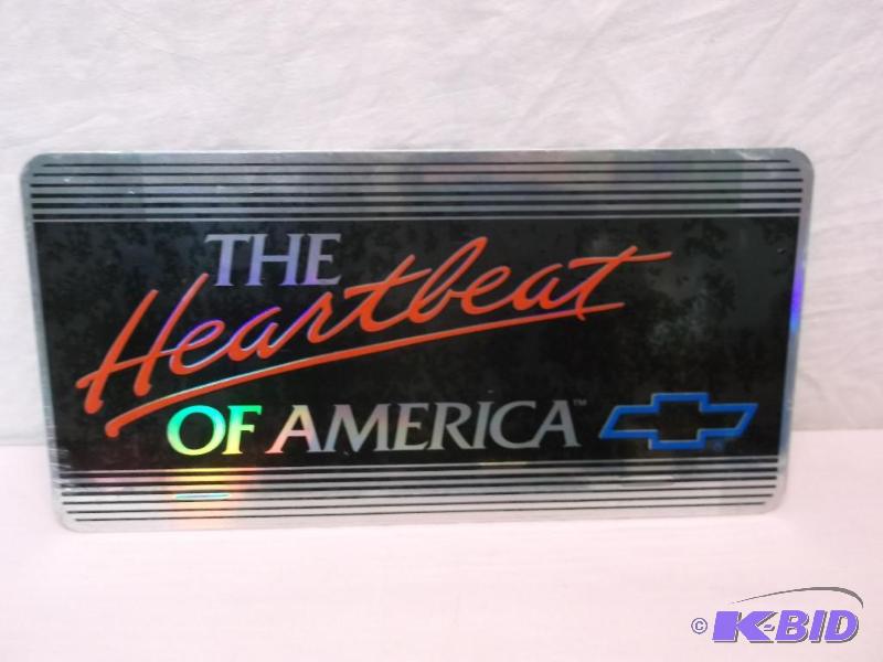 lot 72 image: Collectable license plate sign....