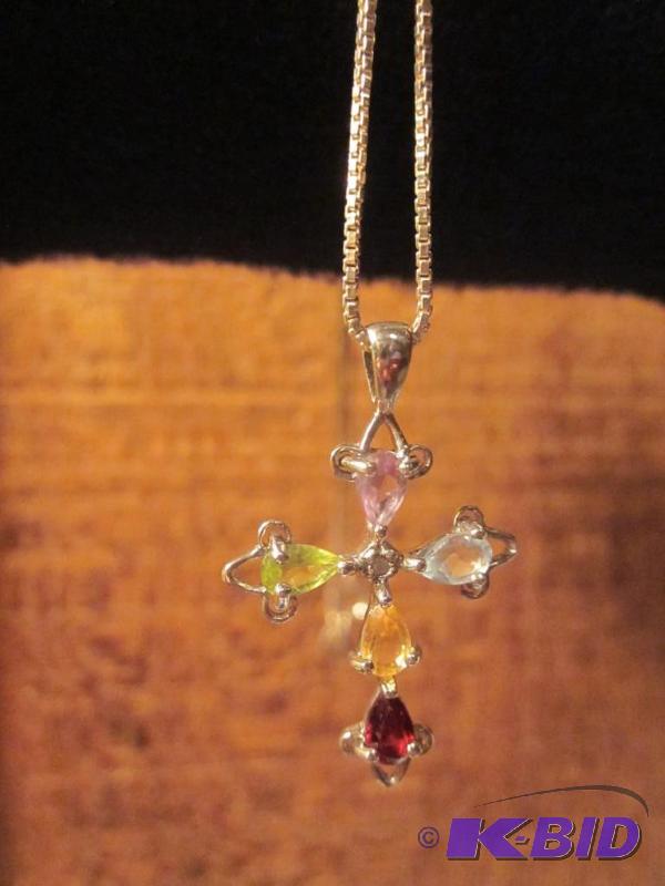 Sterling Silver chain and cross, set with mul...