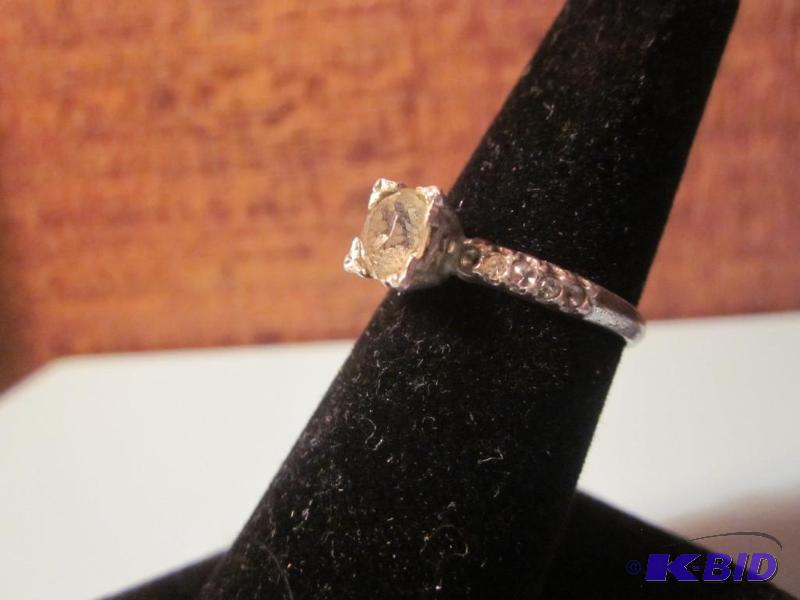 Sterling Silver engagement style ring, size 8...