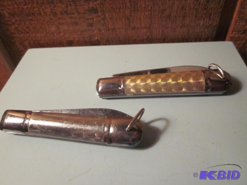 Pair of metallic pocket knives.&nbsp  &nbsp...