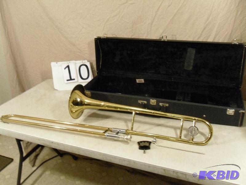 lot 10 image: Bundy Slide Trombone in Hard Case. Dents.&nbs...