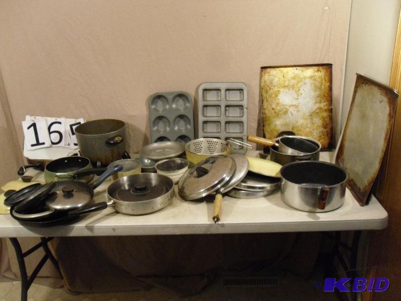 lot 165 image: Assorted pots, pans, lids. Conditions vary. G...