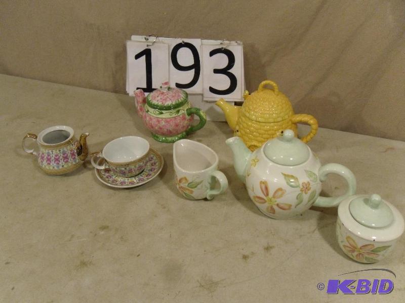 lot 193 image: Crate and Barrel Set, Tea Pots, and More. Con...